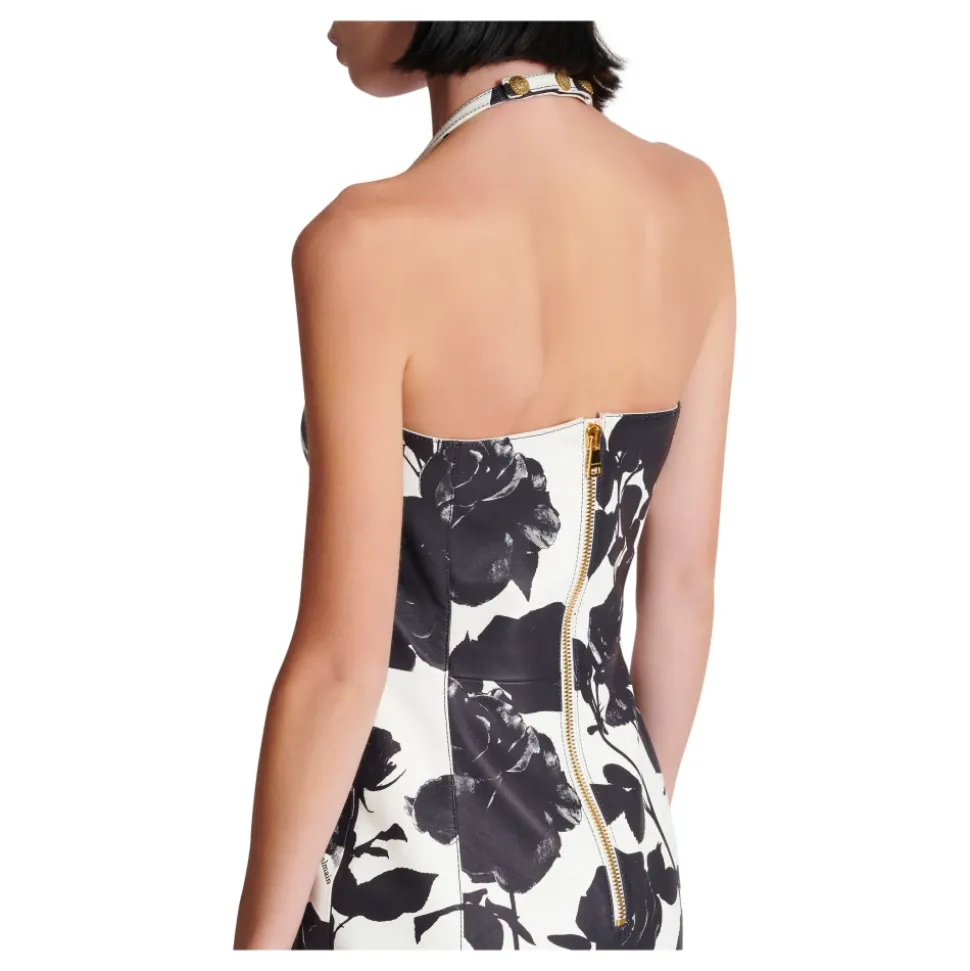 Abito con schiena scoperta in pelle con stampa rose bianche e nere