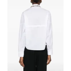 Camicia con decorazioni floreali