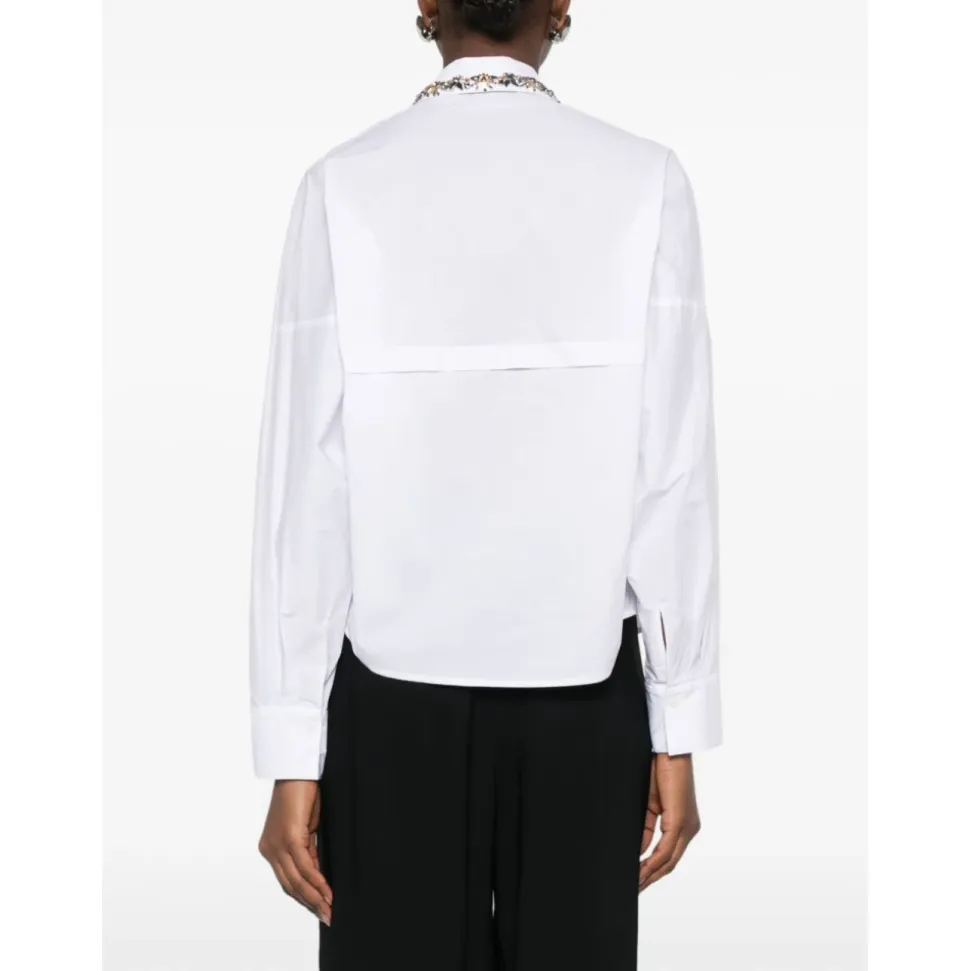 Camicia con decorazioni floreali