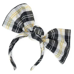 Cerchietto per capelli sui toni dei bianco panna, nero e giallo con grande fiocco decorativo.