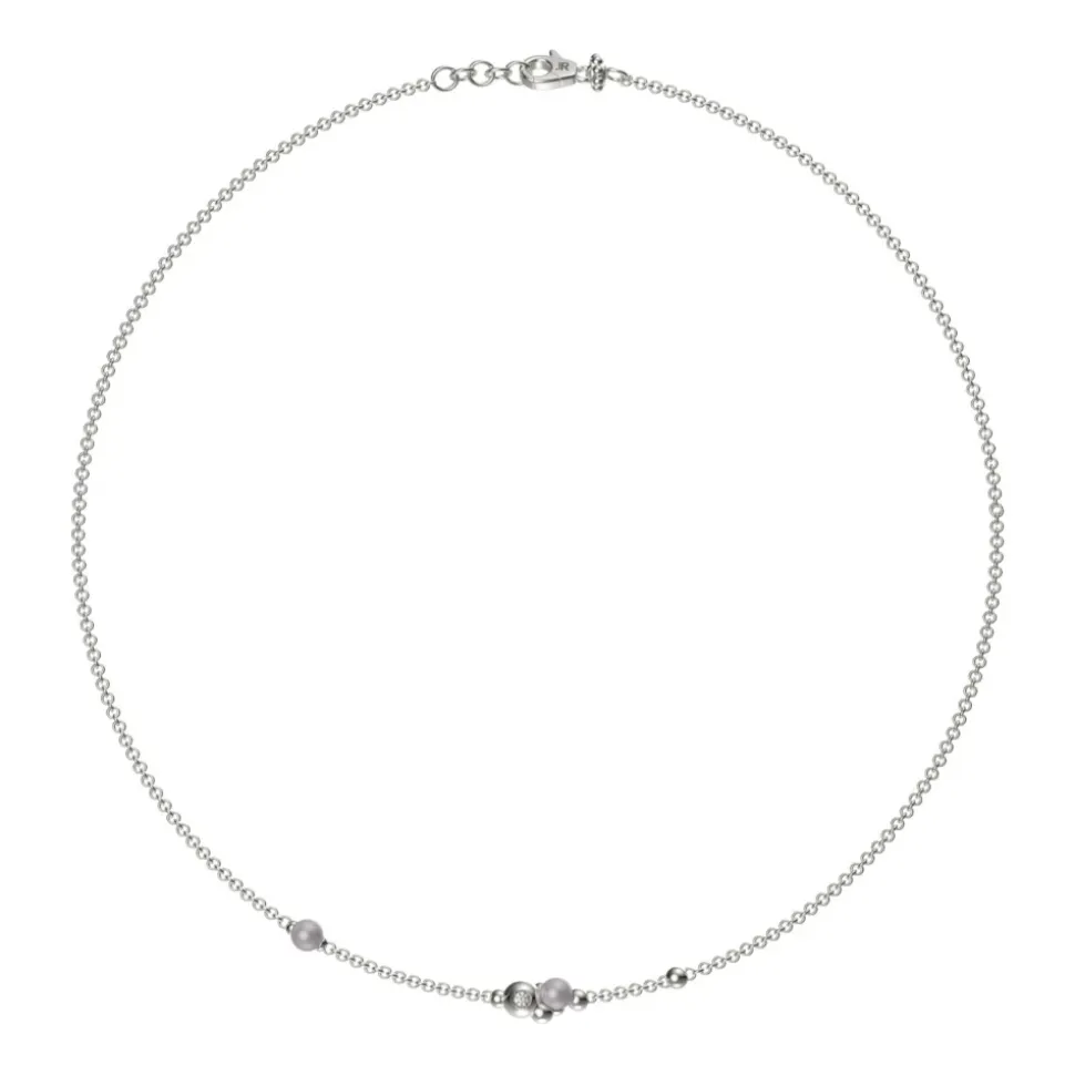 Collana con Elementi Sferici e Dettagli Luminosi