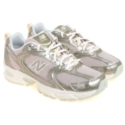 Ginnica New Balance 530 in ecopelle laminata e tessuto