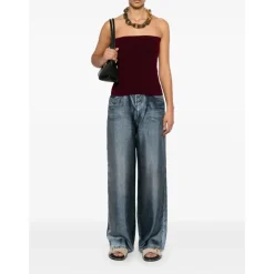 Pantaloni blu con zip e stampa trompe l`oeil