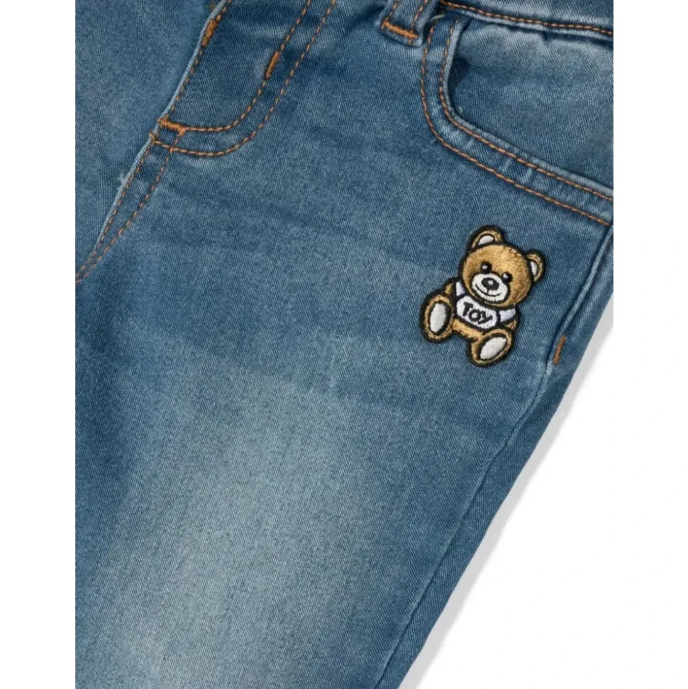 Pantaloni in denim stretch con toppa Teddy